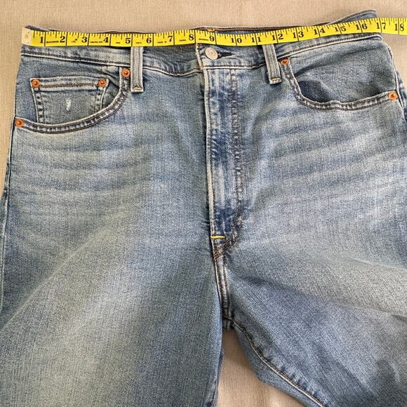 Levi's Ribcage Bell Jeans blown out knee Womens Size 33 - Picture 11 of 14